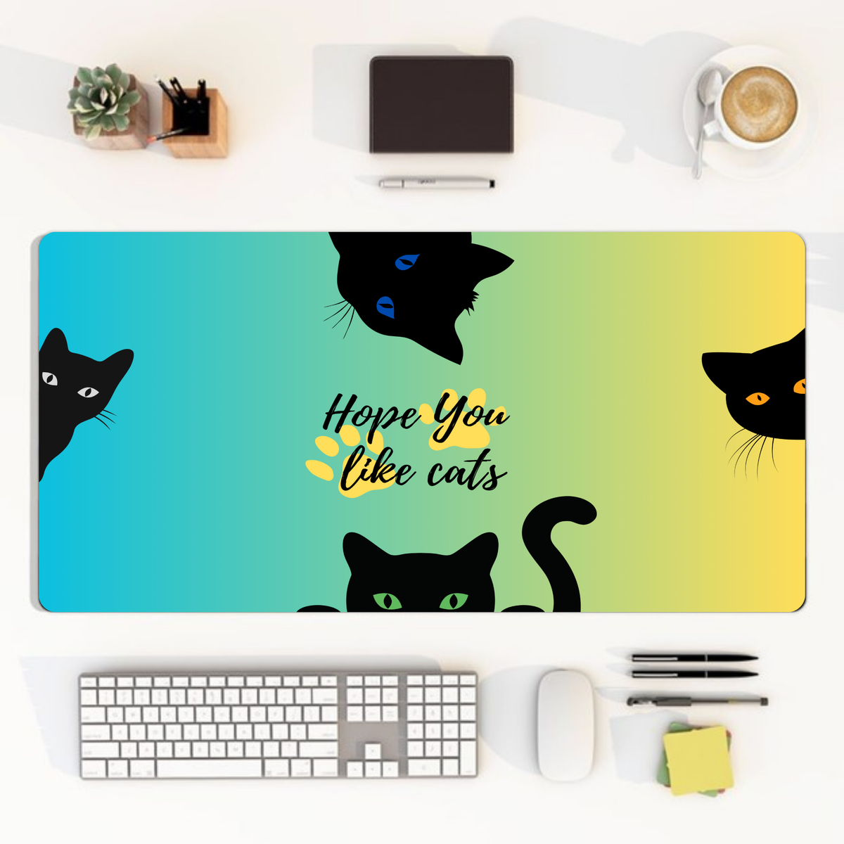 Whimsical black cat mouse pad adding playful charm and cozy vibes to a student or home office desk.