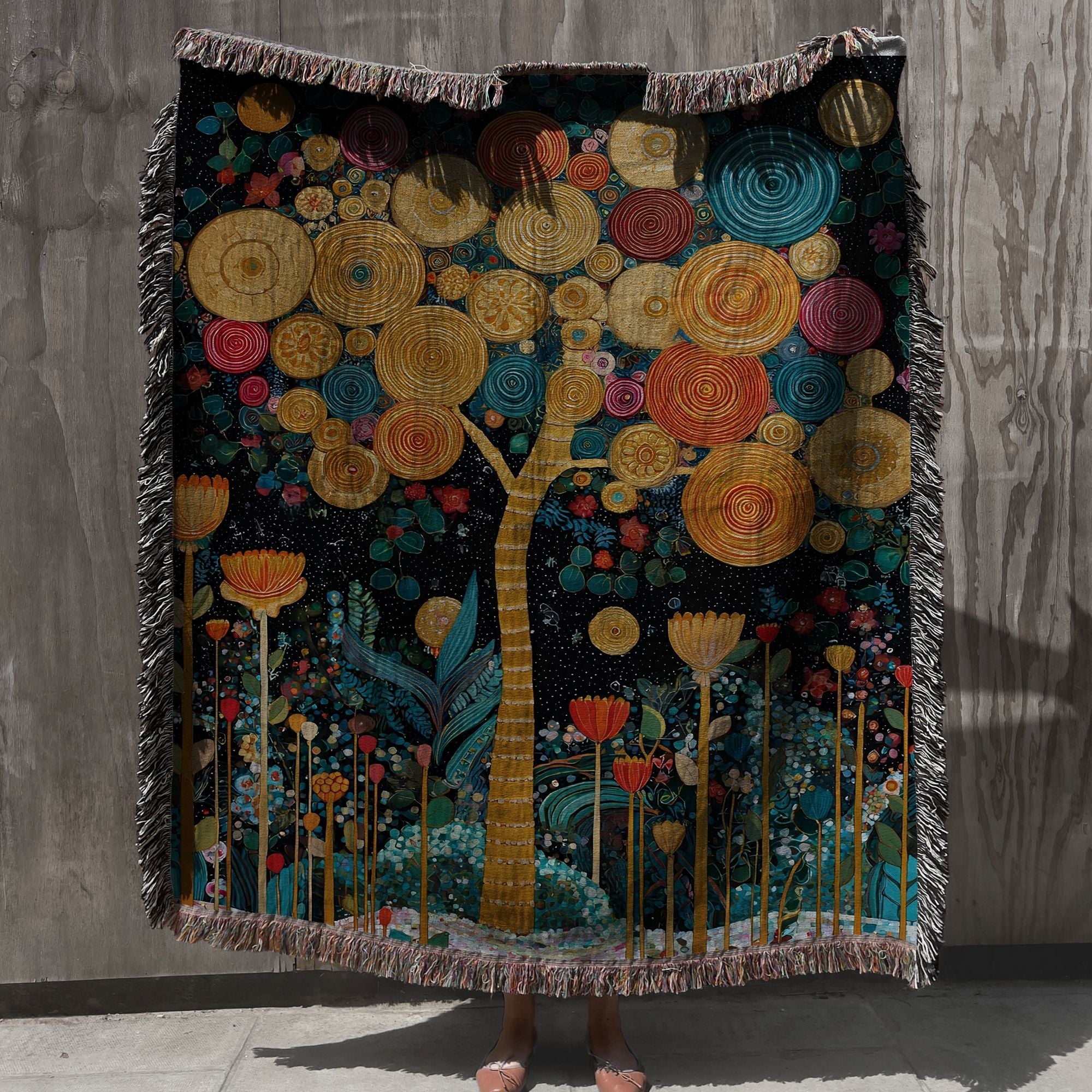 woven cotton blanket with whimsical botanical tree design, tapestry throw blanket with golden tree and floral garden pattern, botanical woven throw blanket with circular flower canopy artwork