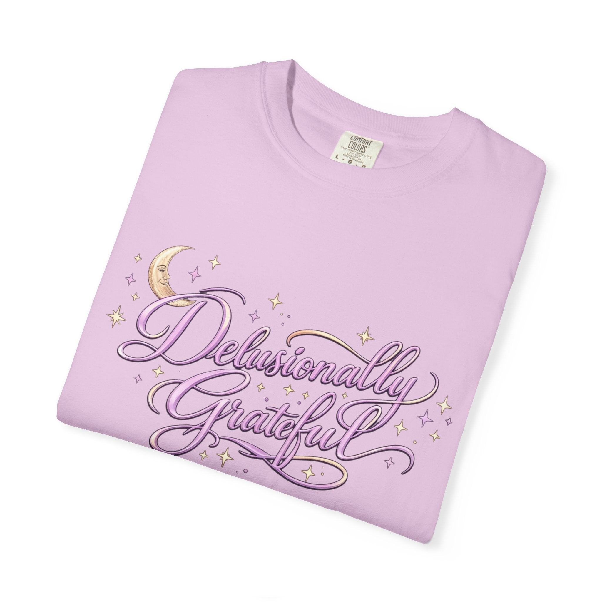 lavender comfort colors shirt with delusionally grateful script design, cozy aesthetic lifestyle mockup
soft pastel purple graphic tee with positive quote, woman holding coffee in relaxed home setting
aesthetic affirmation shirt in lavender, casual outfit with denim shorts and cozy vibe
positive mindset t shirt close up, soft cotton texture with script typography design
cozy lifestyle shirt mockup, gratitude quote tee styled for relaxed everyday wear