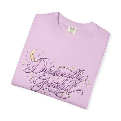 lavender comfort colors shirt with delusionally grateful script design, cozy aesthetic lifestyle mockup
soft pastel purple graphic tee with positive quote, woman holding coffee in relaxed home setting
aesthetic affirmation shirt in lavender, casual outfit with denim shorts and cozy vibe
positive mindset t shirt close up, soft cotton texture with script typography design
cozy lifestyle shirt mockup, gratitude quote tee styled for relaxed everyday wear