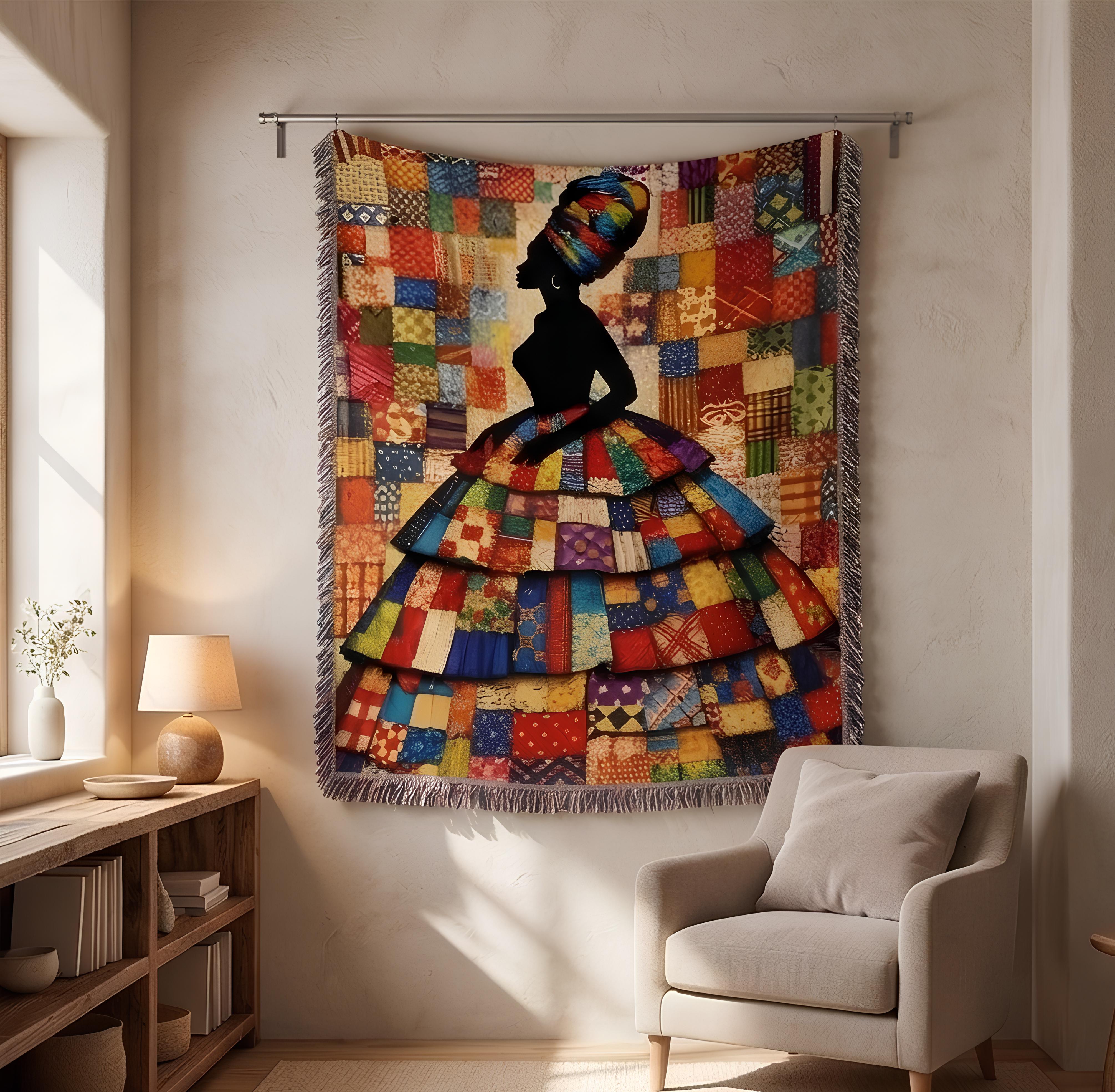 colorful cultural art blanket displayed with fringe detail, gallery style textile art blanket featuring regal feminine silhouette, statement couch throw in rich red blue and gold patchwork