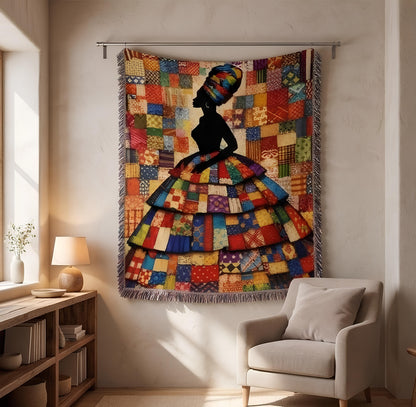 colorful cultural art blanket displayed with fringe detail, gallery style textile art blanket featuring regal feminine silhouette, statement couch throw in rich red blue and gold patchwork