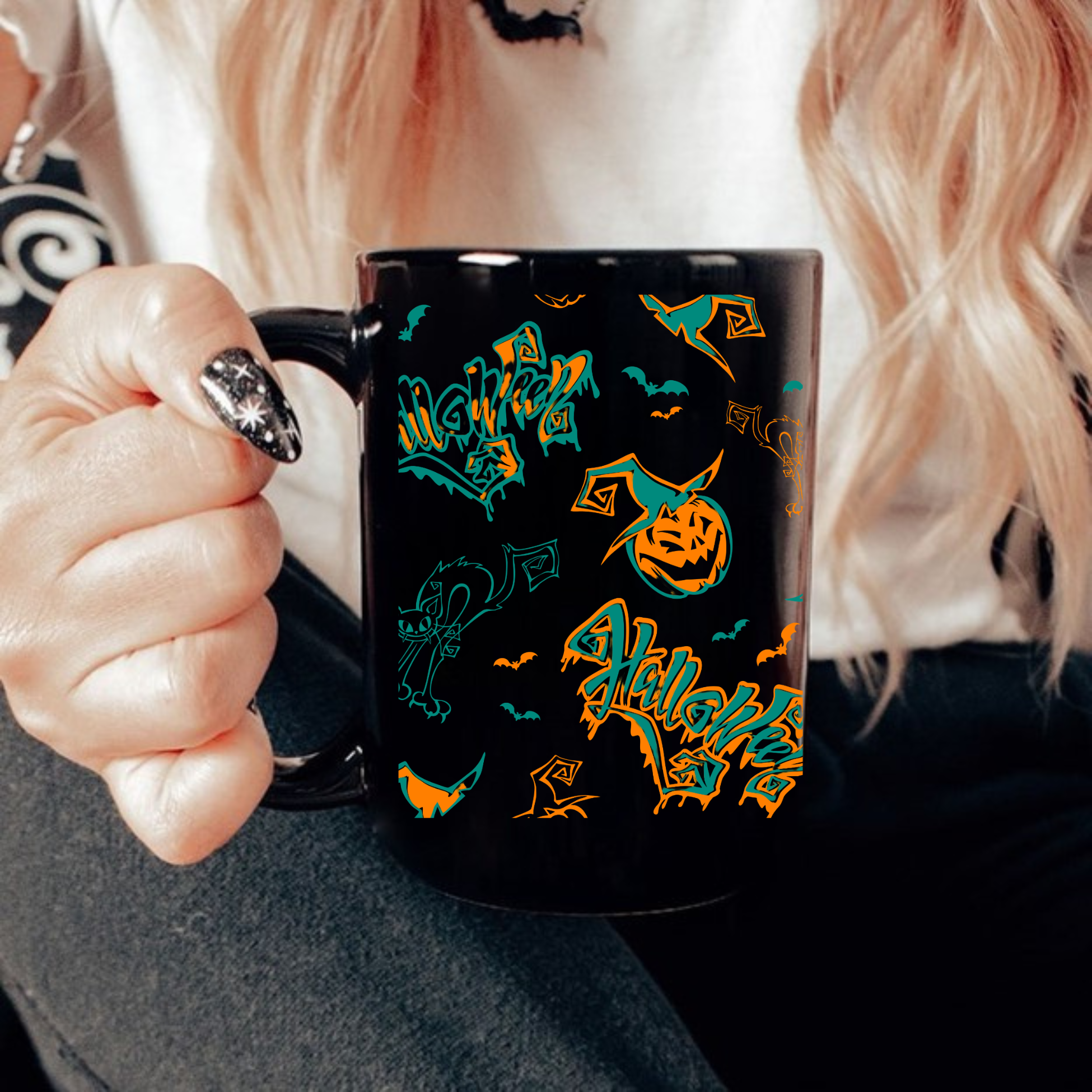 black halloween coffee mug with pumpkin cat bat design,
