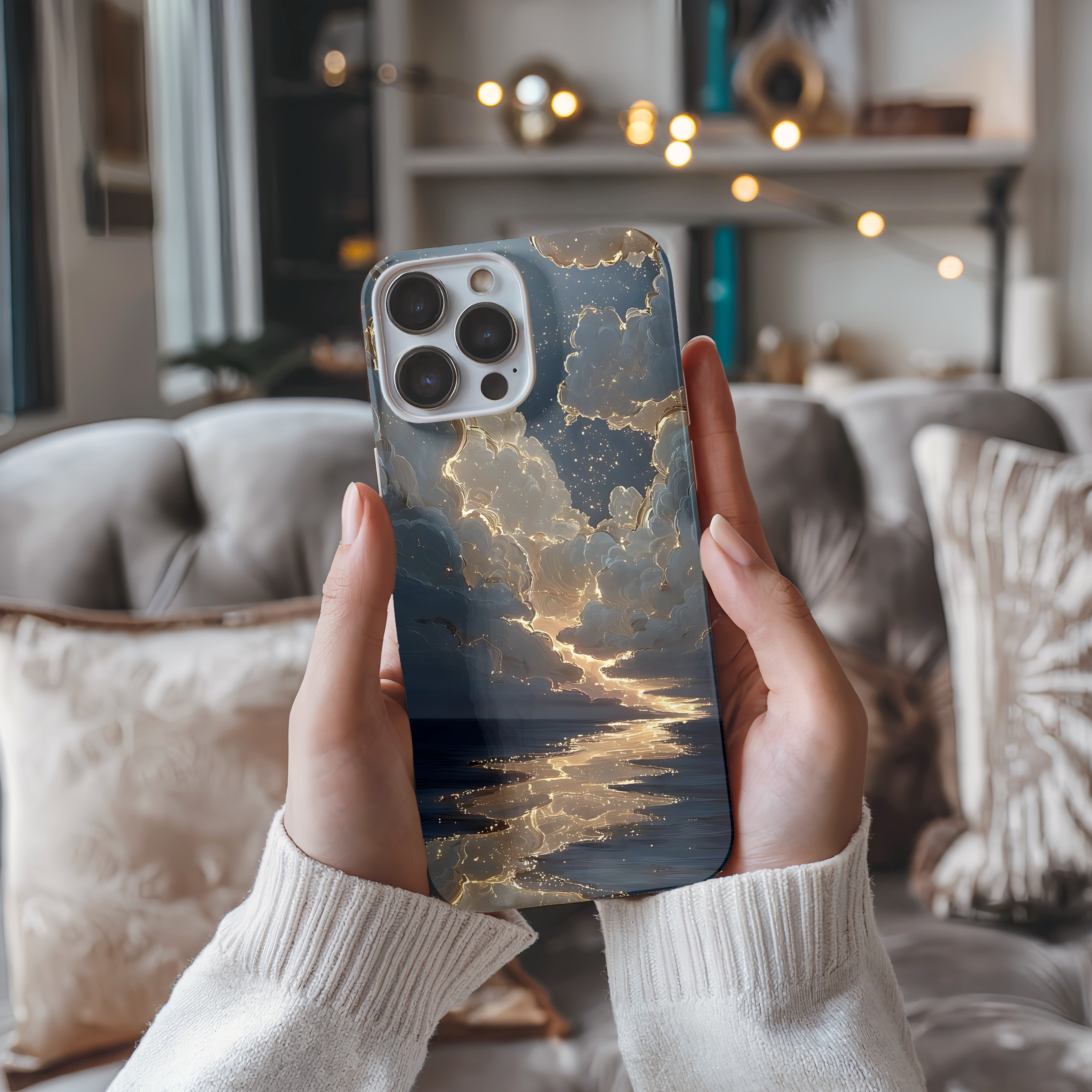 Celestial night sky iPhone case with golden starry clouds in cozy room, Starry cloud galaxy phone case held in hands dreamy aesthetic mockup, Cosmic night sky protective iPhone cover with shimmering starlight reflection