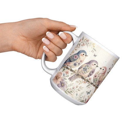 Birds_Mug_15oz_15ozWhiteMugLifestyleLHRaisedAngle_Mockup.png_15872452