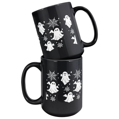 Glossy black coffee mug with ghosts and spiderwebs, fun gothic Halloween kitchen décor.