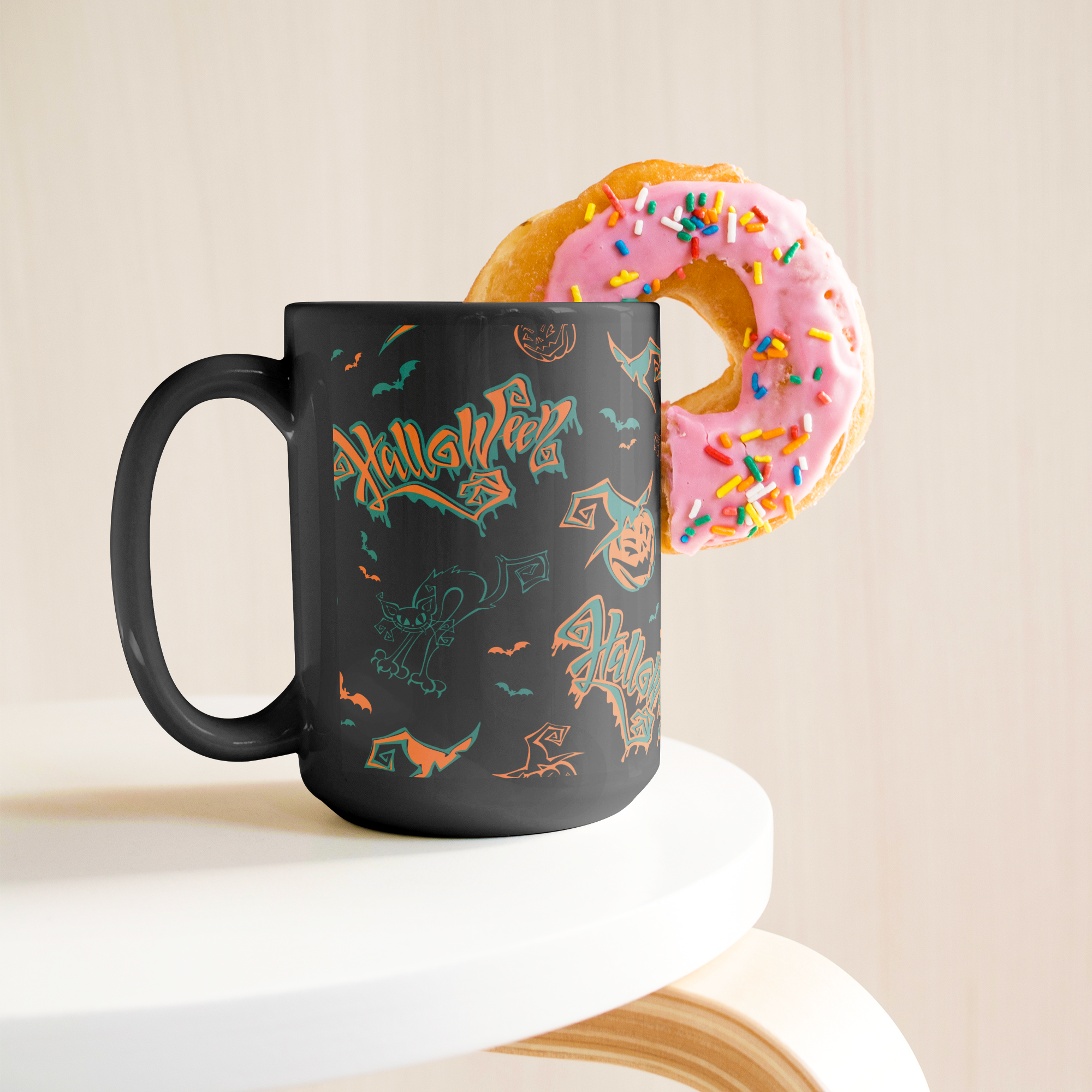 spooky bat cat pumpkin design on black mug,
