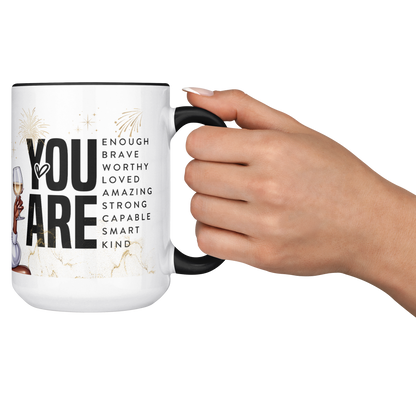 Stronger_than_the_storm_15oz_mug_Lifestyle_RH_Cheers_Mockup.png
