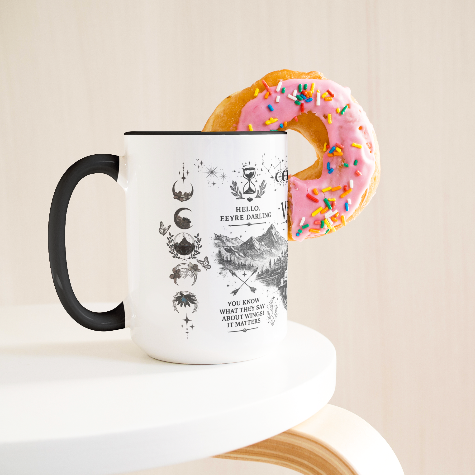 Velaris_15oz_Black_Accent_Mug_Lifestyle_Donut_LH_Mockup.png_15659436