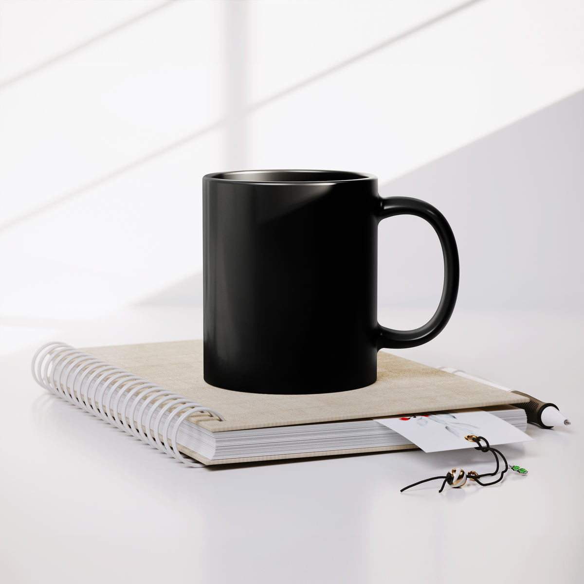 Velaris_City_of_Starlight_blk_11oz_mug_Lifestyle_Notebook_Mockup.png_16129928
