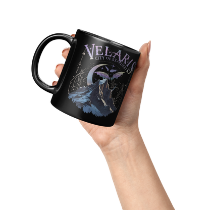 Velaris_City_of_Starlight_blk_11oz_mug_Lifestyle_Raised_Hand_LH_Mockup.png_16129930